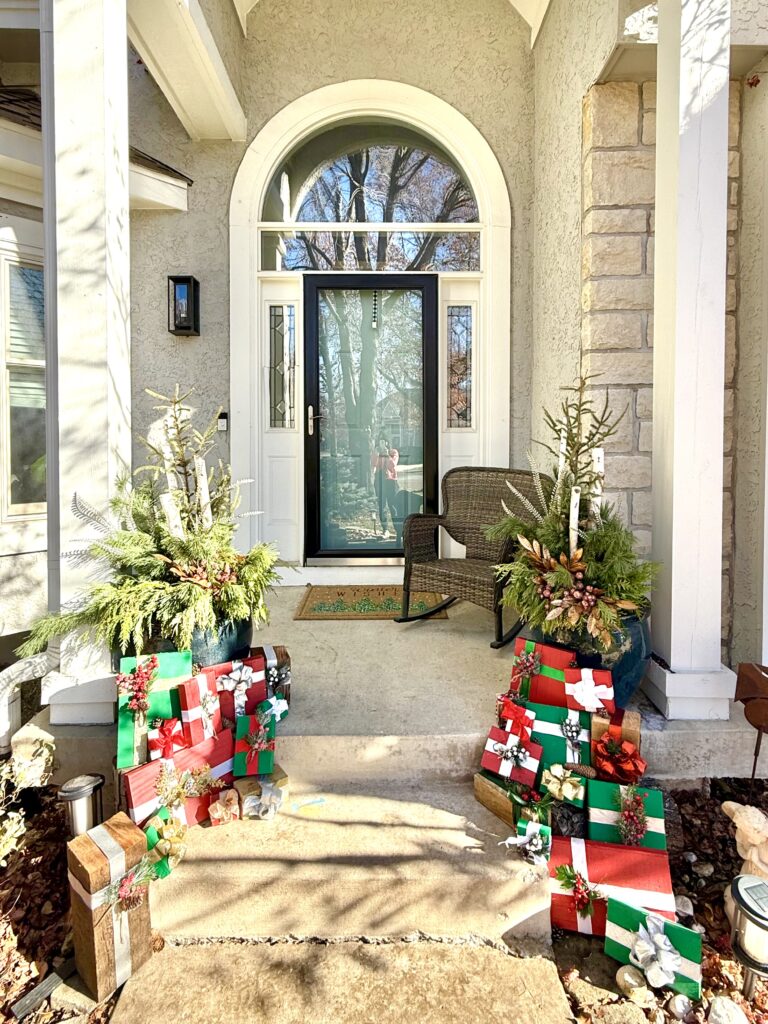 Harvest porch décor with greenery KC